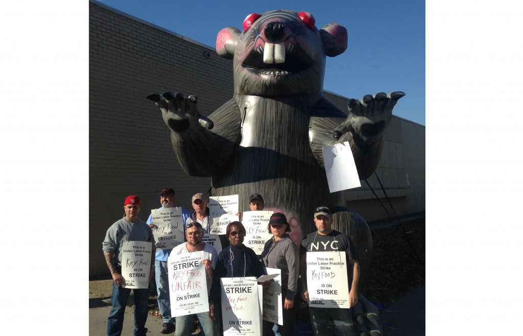Protesters picket against the firing of meat department workers at the new Key Food supermarket at the former Waldbaum's location in Lindenwood.