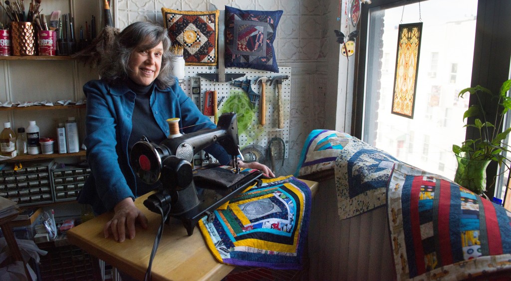 Artist Sharon Florin creating quilts and commemorative pillows at her Long Island City studio.