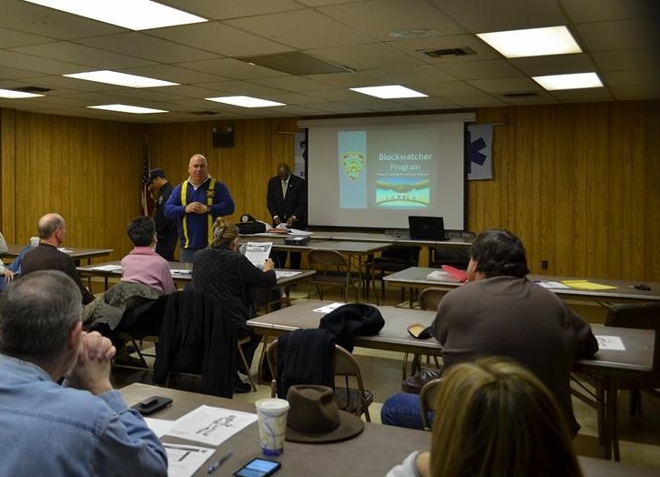 Detective Kevin O'Donnell instructs Whitestone residents in the neighborhood's first block watch class in March 2015.