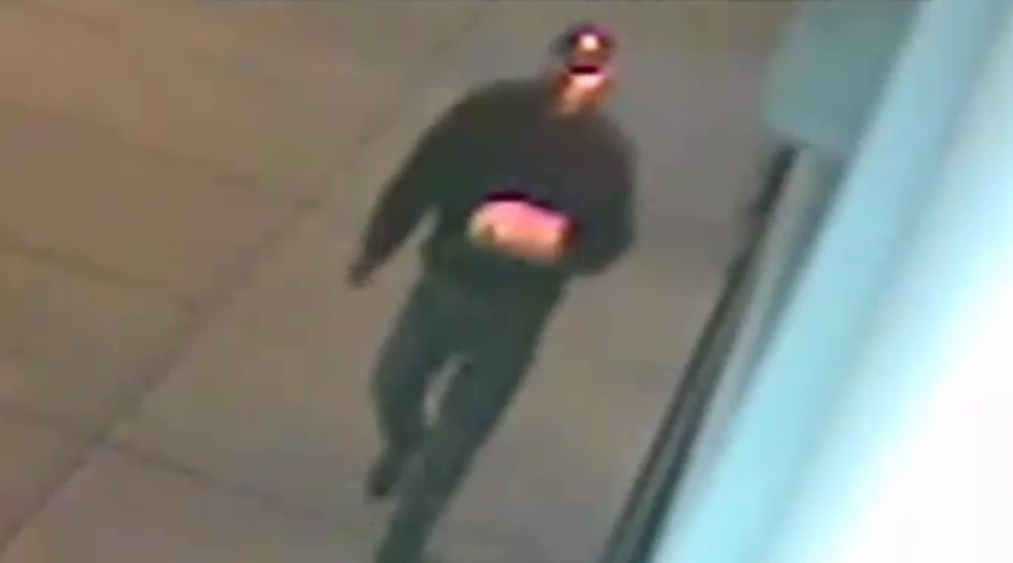 This suspect was seen setting rubbish fires along Austin Street in Forest Hills on the night of Dec. 9.