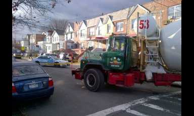 A cement truck struck three pedestrians walking across Junction Boulevard and 55th Avenue in Elmhurst on Wednesday afternoon.