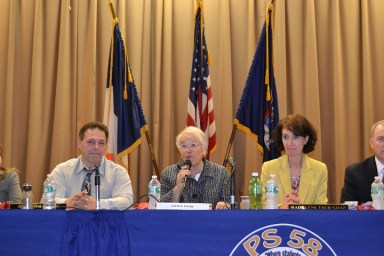 School Chancellor Carmen Fariña (center) at the District 24 Community Education Council meeting at P.S. 58 in Maspeth.