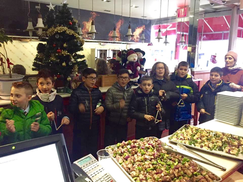 The 5th graders who took part in the caroling trip will be the school's first graduating class.