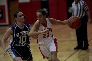 Veteran McClancy runs past St. Edmund