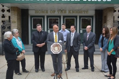 Councilman Paul Vallone (center) advocating for the passing of this bill in front of Holy Cross High School in May.
