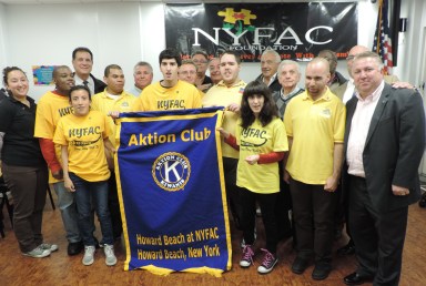 Members of the Aktion Club of Howard Beach with members of the Howard Beach Kiwanis Club and the New York Families for Autistic Children.