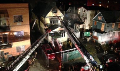 The FDNY battled a two-alarm fire at an Elmhurst home early Monday morning.