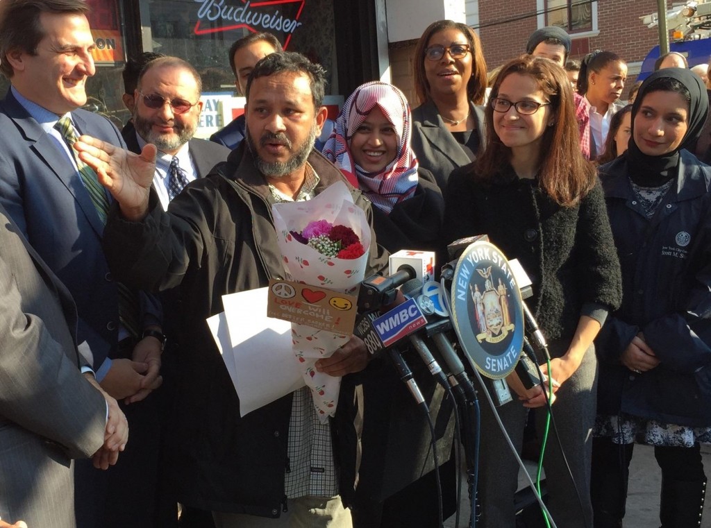 Astoria residents and politicians gathered in front of Fatima Food Mart on Thursday to show support for the owner Sarker Haque.