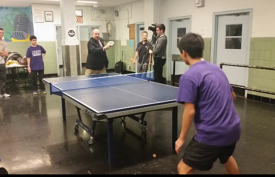Councilman Lancman playing a match against an eighth-grader at M.S. 216.