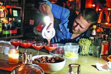Mike Di Tota pours the winning cocktail
