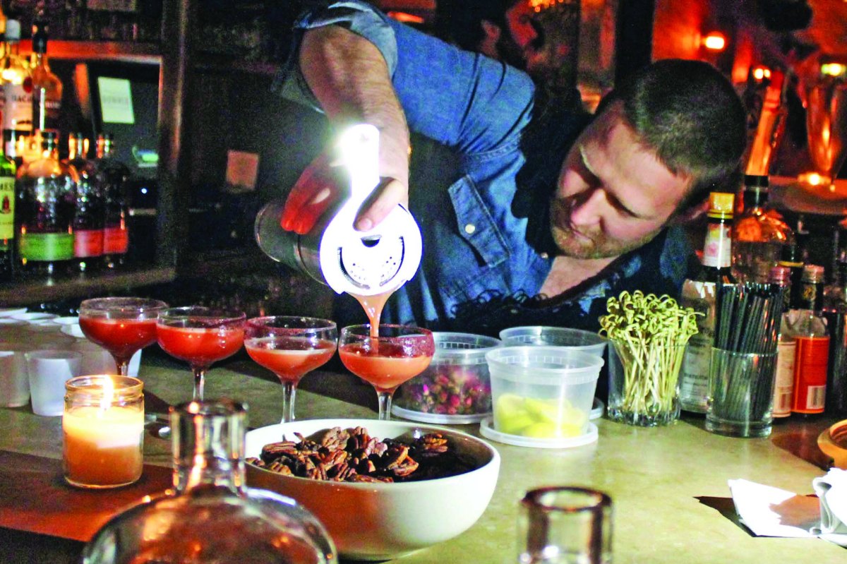 Mike Di Tota pours the winning cocktail