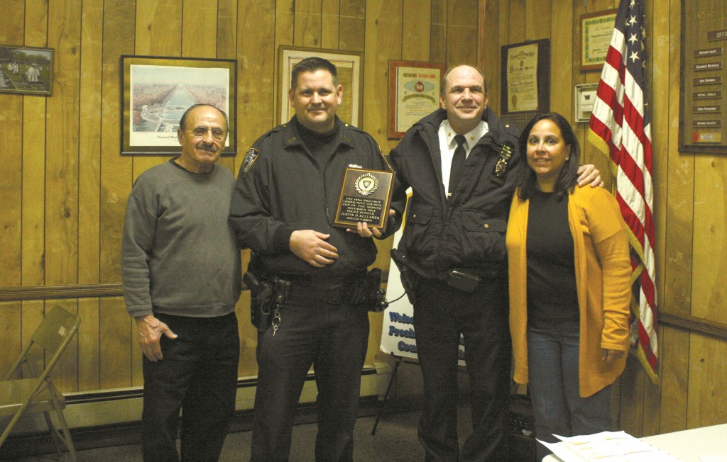 Shown from left to right: Precinct Council Assisting Secretary Michael Liquori, Cop of the Month Officer Justin Kellaher, Deputy Inspector Christopher Manson and Precinct Council Vice President Marta Lebreton.