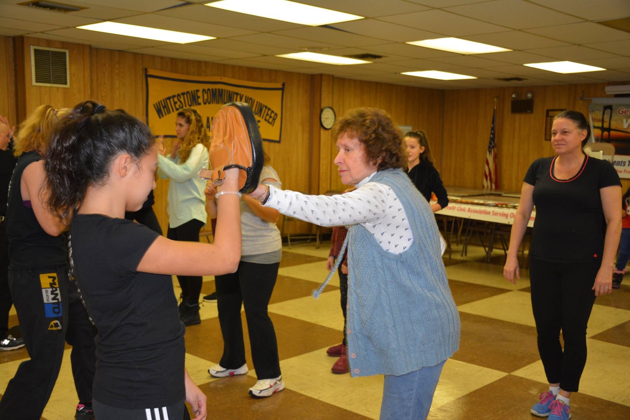Female Whitestone residents utilizing techniques learned in the workshop.