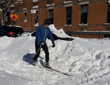 A cross-country skier easily travels on an unplowed 60th Lane in Ridgewood following the Blizzard of 2016.