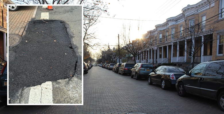 The road continues to cave in at Ridgewood's Stockholm street, even after asphalt repairs were made last month.