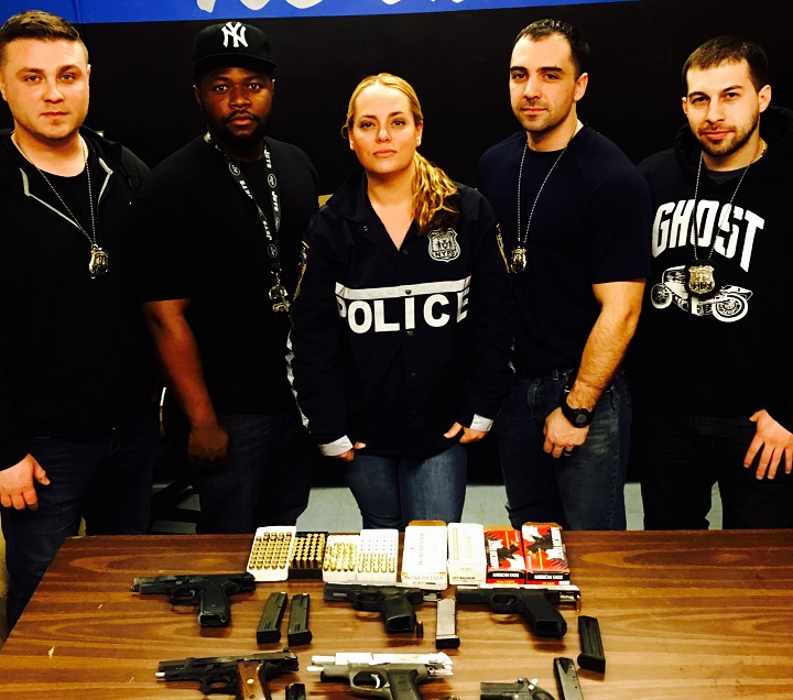 These members of the 103rd Precinct Anti-Crime Unit-- (from left to right) Police Officers Robert DiFalco and Benjamin Aboagye, Sergeant Mary Humburg and Police Officers Joseph Degirolamo and Daniel Gasperetti busted a Jamaica man Wednesday who kept a gun cache in a disabled vehicle.