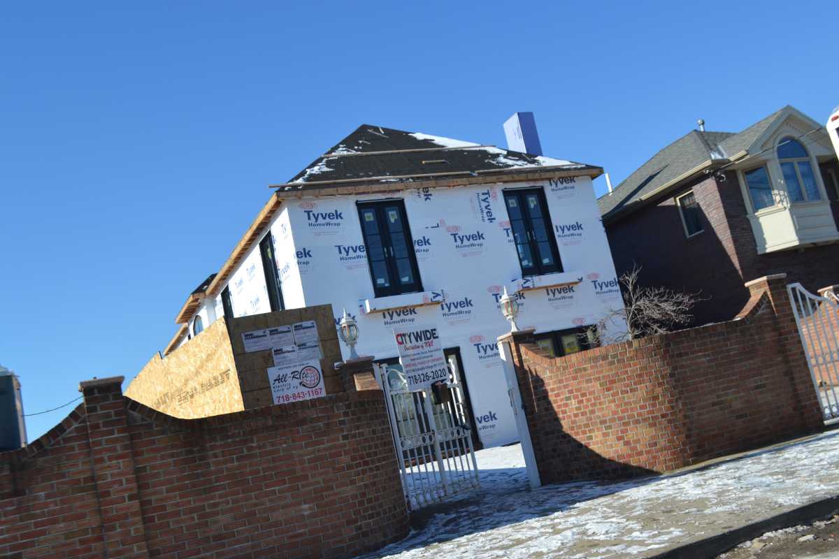A local lawmaker wants the DEP to stop charging minimal fees to homeowners still displaced and rebuilding after Hurricane Sandy.