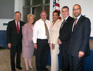 Alvin Warshaviak (third from left), pictured in this April 2007 photo, is stepping down as chairman of Community Board 8.