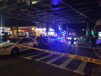 Police secure the corner of Jamaica Avenue and 85th Street Wednesday night after a man was stabbed.