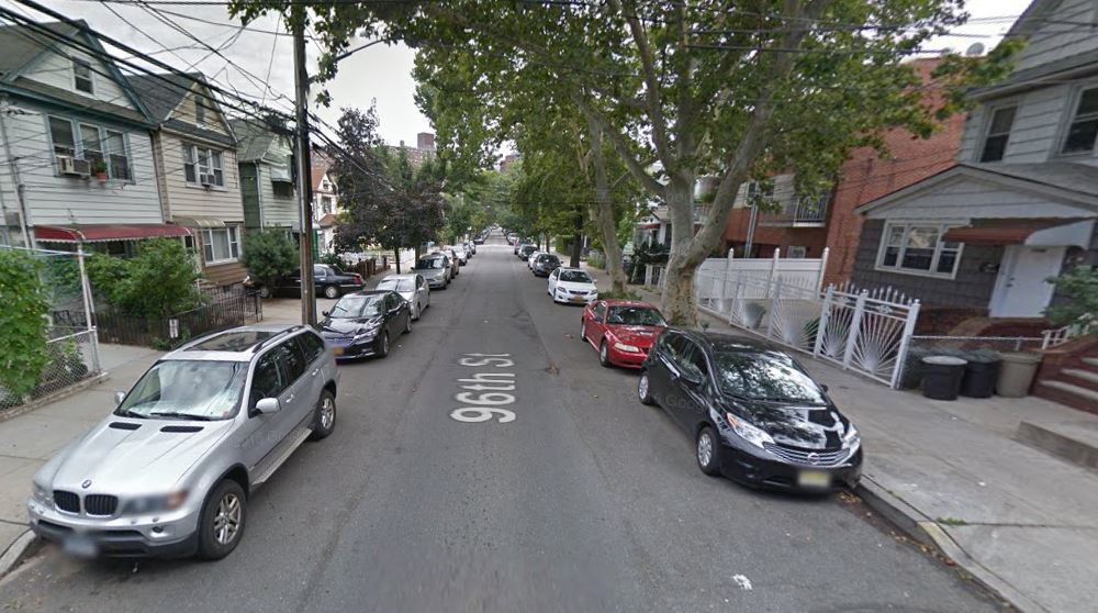 A pair of NYPD detectives allegedly assaulted a man on this Corona block last October.