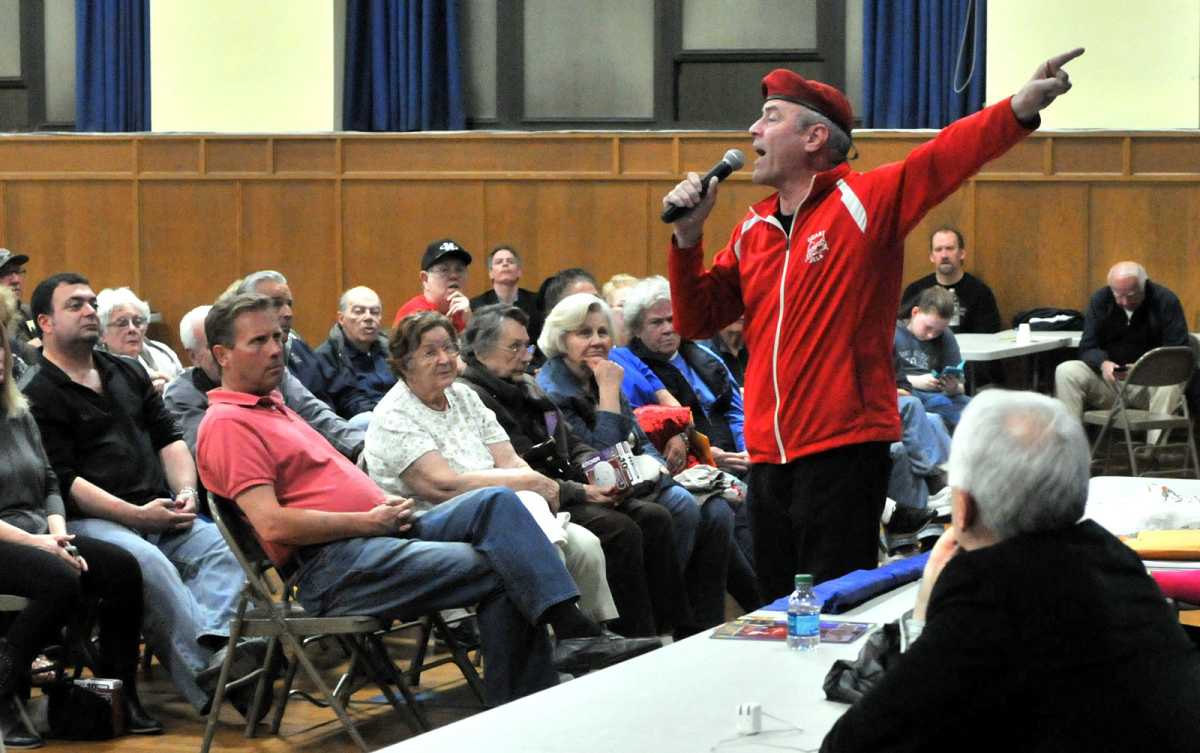 Curtis Sliwa addresses residents at the April 21 Juniper Park Civic Association meeting.