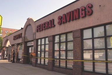 Maspeth Federal Savings Bank on Woodhaven Boulevard remained closed on May 31, 2016, more than a week after it was burglarized for millions in valuables.