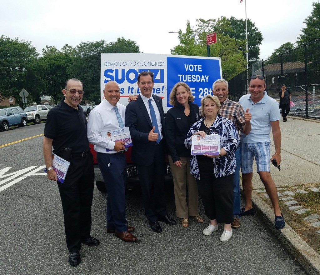Former Nassau County Executive Tom Suozzi (third from left) with Queens Borough President Melinda Katz, Councilman Paul Vallone and other Queens supporters who helped him win Tuesday's Congressional primary.
