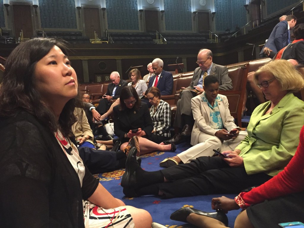 Congresswoman Grace Meng (at left) participates in the sit-in on the floor of the House of Representatives.