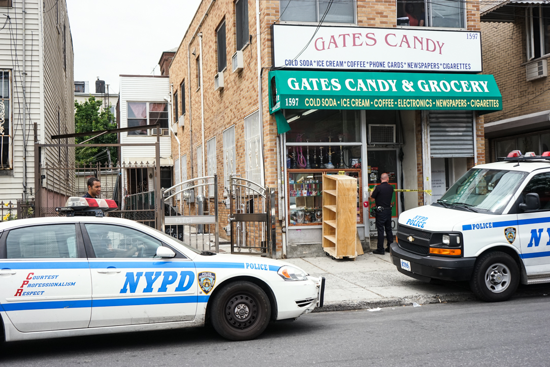 Police vehicles outside the Gates Candy shop in Bushwick following a drug raid on Thursday.