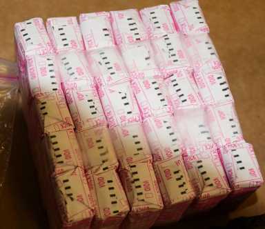 Multiple doses of Heroin and Fentanyl packaged in Quick Pick paper seized during search warrant