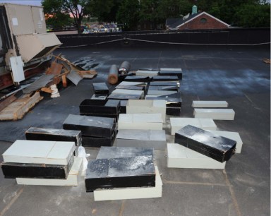 Compromised safe deposit boxes on the roof of the Maspeth Federal Savings bank in Rego Park following a May burglary.