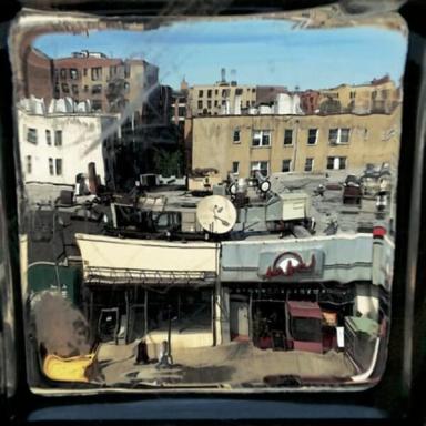 Looking through a window on Queens from both sides of the glass