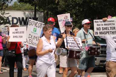 Saturday's protest march against a proposed homeless shelter in Maspeth drew nearly 2,000 people, but no local elected officials.
