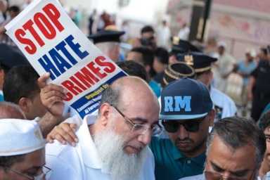 Investigators search for motive in imam murder