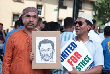 Man charged with murder of imam and associate
