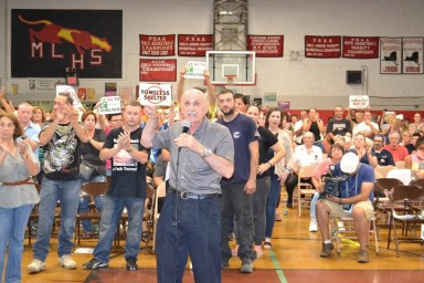Maspeth residents spoke out in force against a proposed homeless shelter on Aug. 11, but the subject was first broached at a closed-door meeting eight days earlier at the Maspeth library.