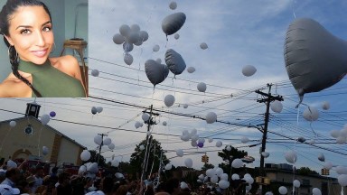 White balloons head to the sky in Howard Beach on Tuesday night in memory of Karina Vetrano.