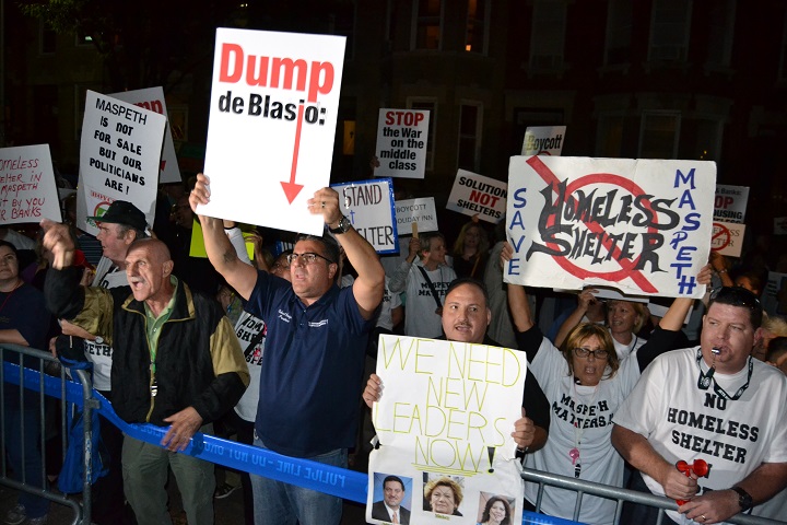 Those protesting the Maspeth shelter say the mayor isn't fooling anyone by changing course on the proposal.
