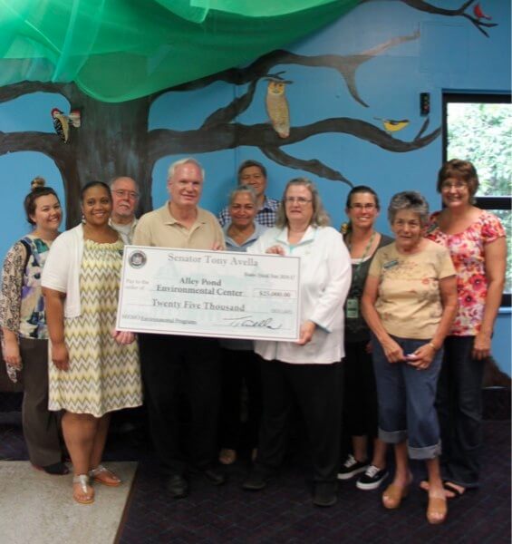 Avella delivers grant to Alley Pond Environmental Center
