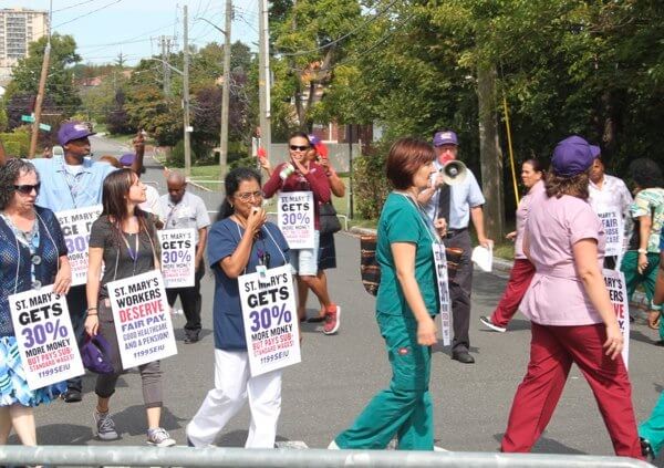Healthcare workers picket at St. Mary’s in Bayside
