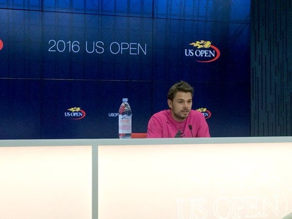 Wawrinka draws attention with first-round victory