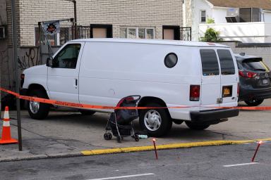An 8-month-old boy was fatally struck by this van as it backed out of a driveway in East Elmhurst on Friday morning.