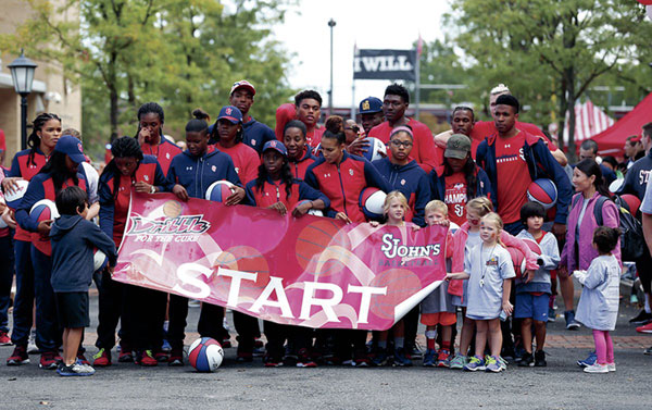 SJU players use hoops skills for worthy cause