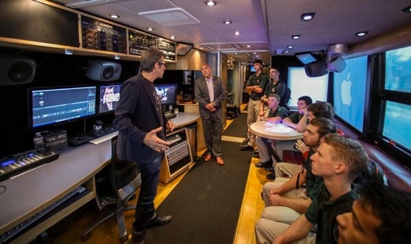 John Lennon bus makes stop at Holy Cross High School