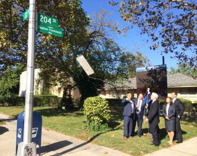 Street renamed for beloved Bayside softball coach