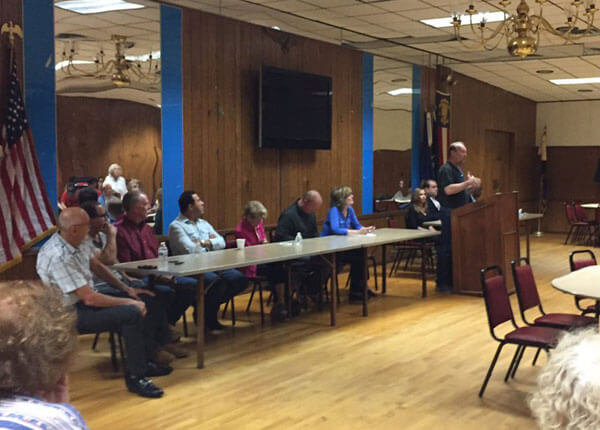 Bioswales, scam artists, discussed by community organization