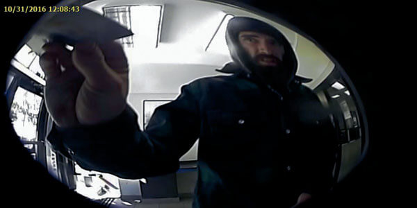 Man sought in Flushing bank robbery