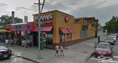 A 22-year-old man was shot near this Popeye's restaurant in Corona on Sunday night.