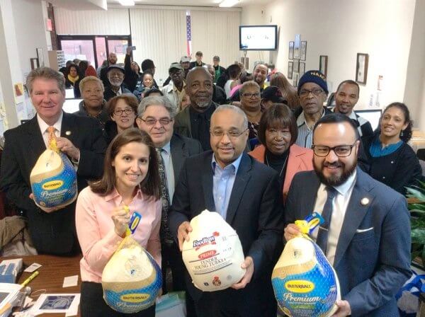 Electeds, Woodside on the Move distribute 1,000 Thanksgiving turkeys