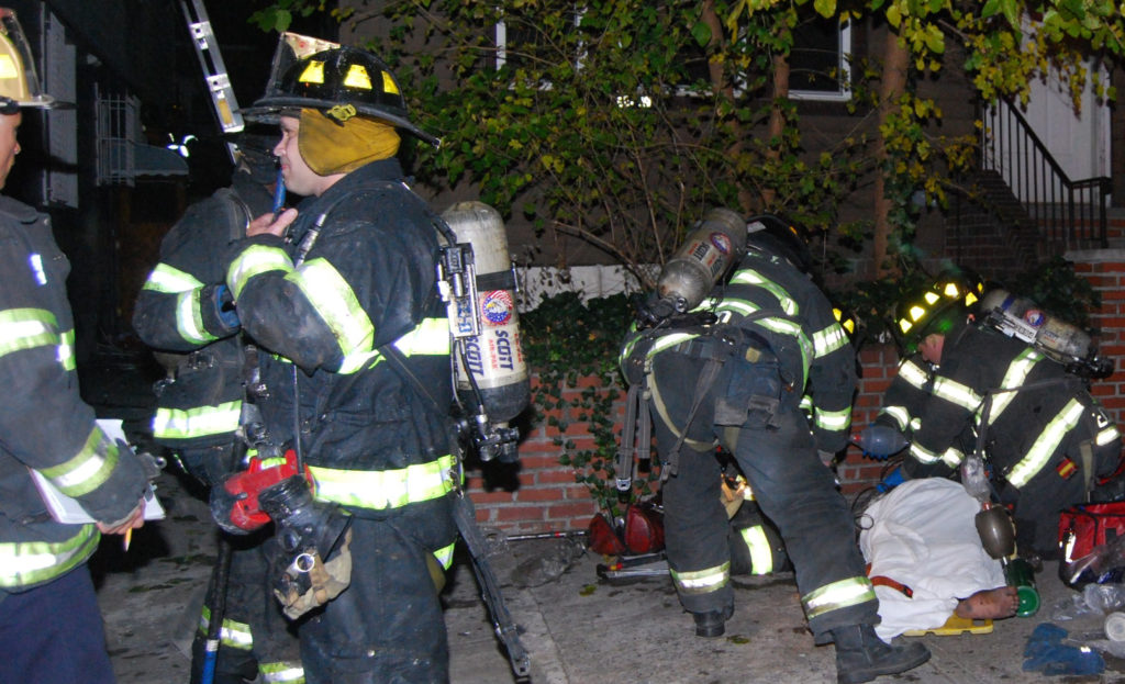 Three men died in a fire inside the illegally converted apartment in Woodside where they lived in November of 2009.